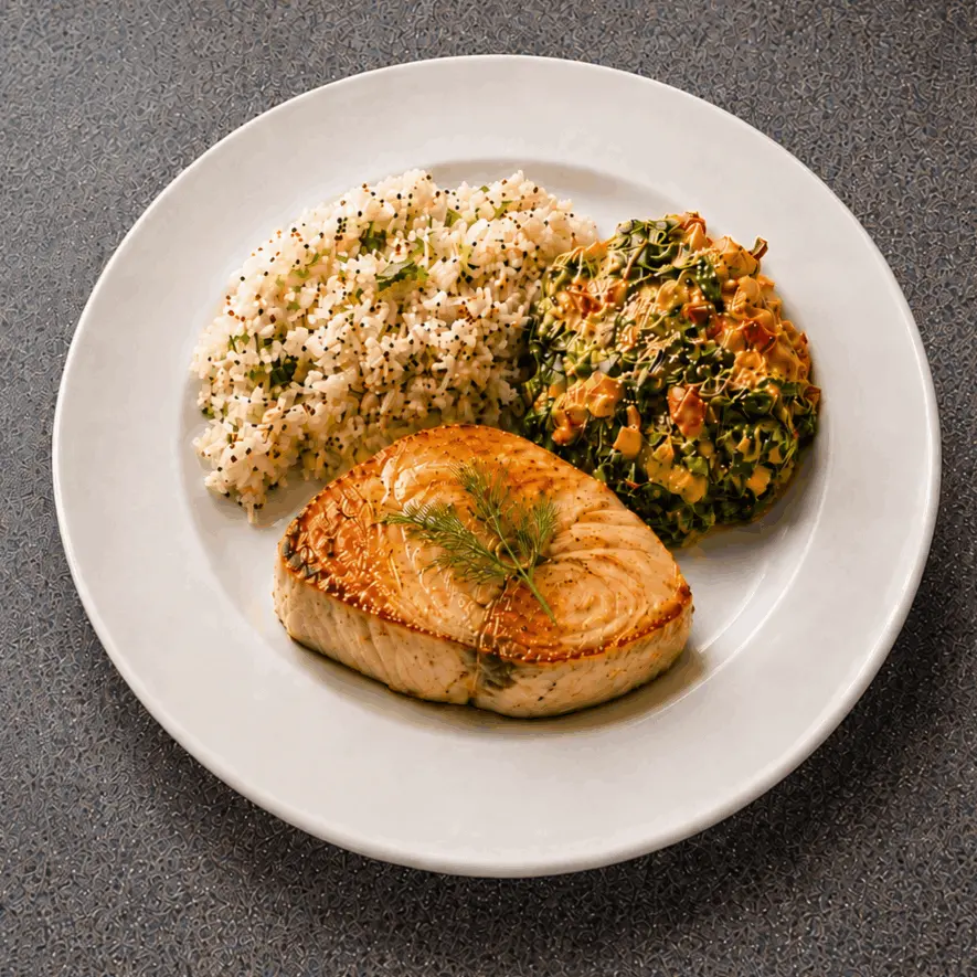 A succulent swordfish steak, gently seared until golden and tender, served with Swiss chard enveloped in a silky homemade tahini cream sauce. Finished with toasted sesame notes and paired with delicately seasoned rice, this dish balances the richness of the sea with earthy greens, nutty warmth, and elegant simplicity.